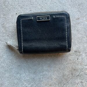 Tumi Sinclair Zip Around Small Wallet black leather.